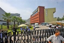 温州信泰集团胡福林回到温州 接受采访谈重振企业和