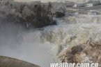山西吉县气温回升 黄河壶口瀑布冰化河开场面壮观