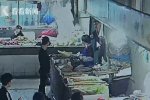 男子提10万元买菜 有精神