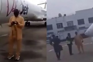 尼日利亚歌手被拒绝登机后站在飞机前阻止飞机起飞